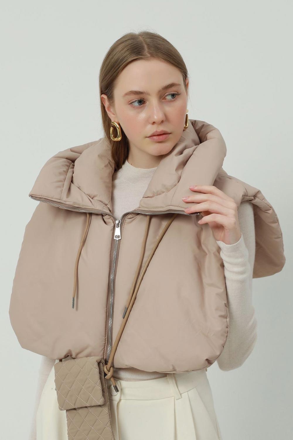 Bodywarmer /capuchon Beige